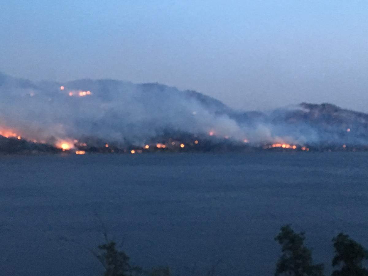 The Mount Eneas fire continues to be classified by BC Fire Service as Out of Control but more residents are being allowed back into their homes.