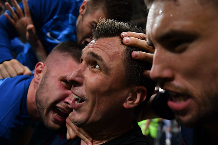 World Cup photographer crushed by celebrating Croatian team, captures every moment - image