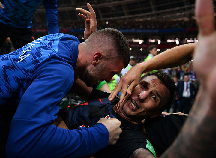 World Cup photographer crushed by celebrating Croatian team, captures every moment - image