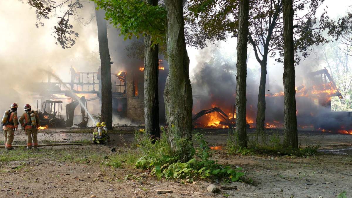The fire tore through a home on Senneville Road early Wednesday afternoon. 