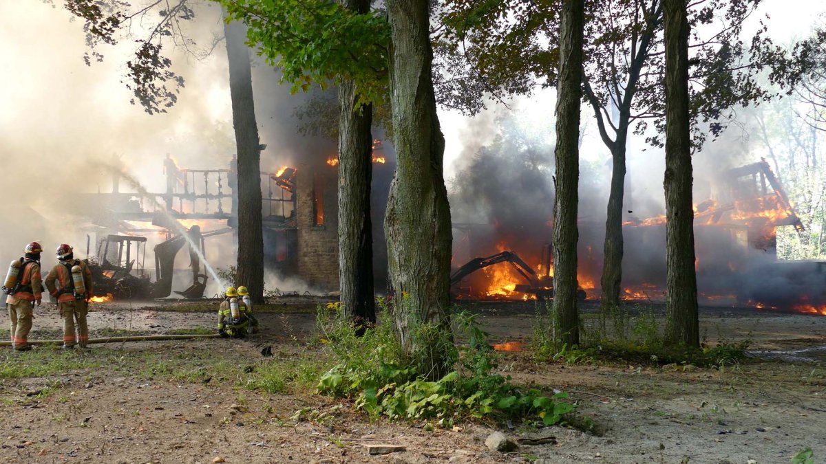 The fire tore through a home on Senneville Road early Wednesday afternoon. 