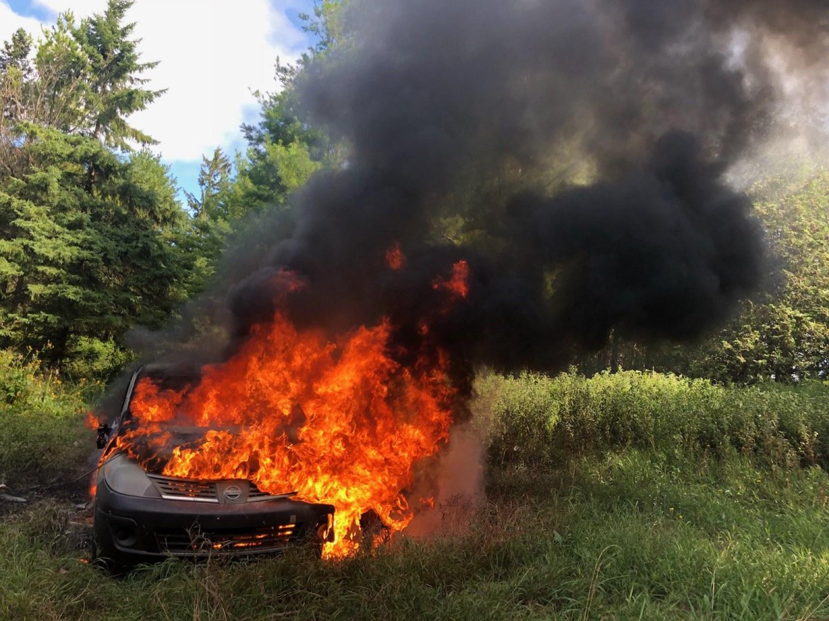 OPP say the Nissan was driven into a wooded area and set on fire.