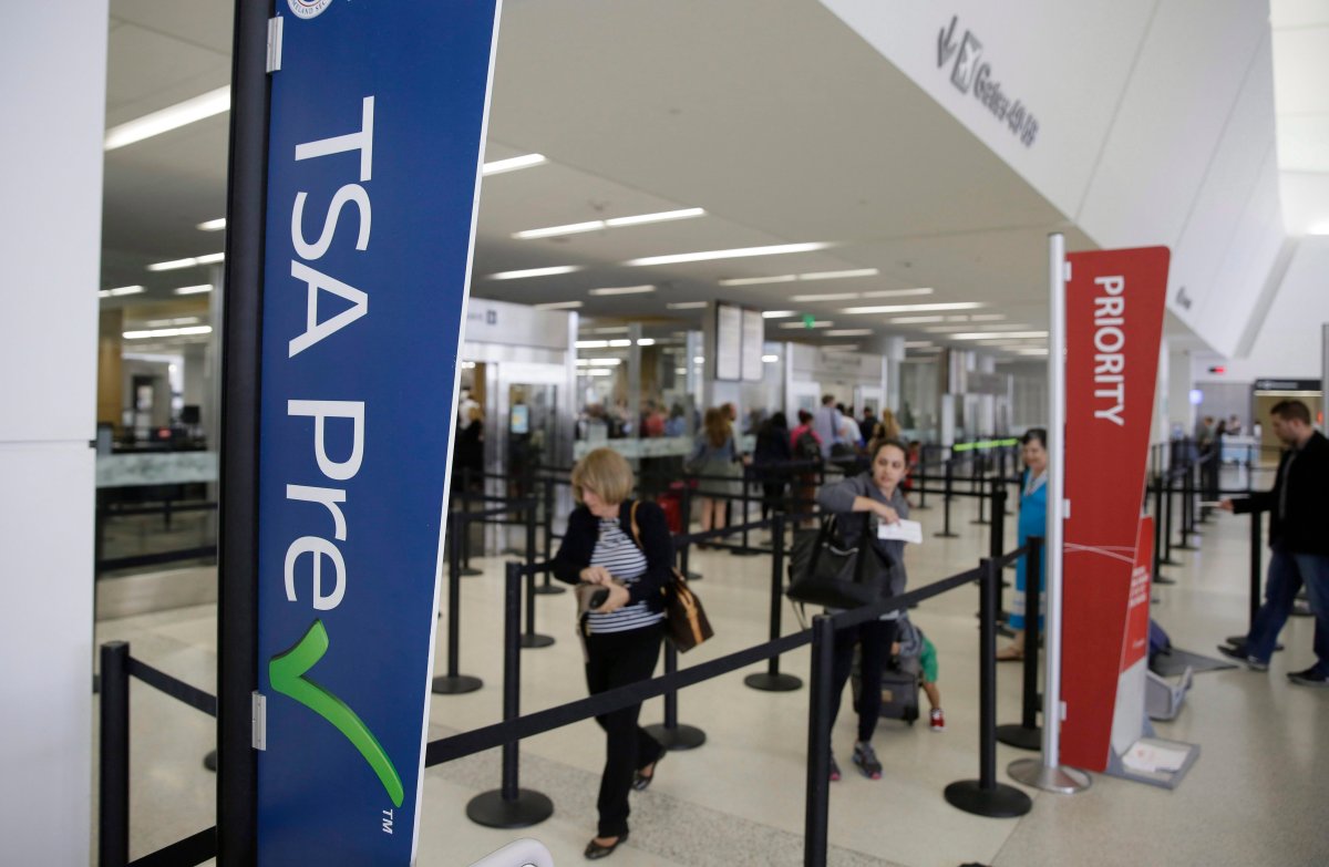 In this June 29, 2016, file photo passengers make their way through a TSA Precheck security line inside Terminal 2 of San Francisco International Airport in San Francisco. 