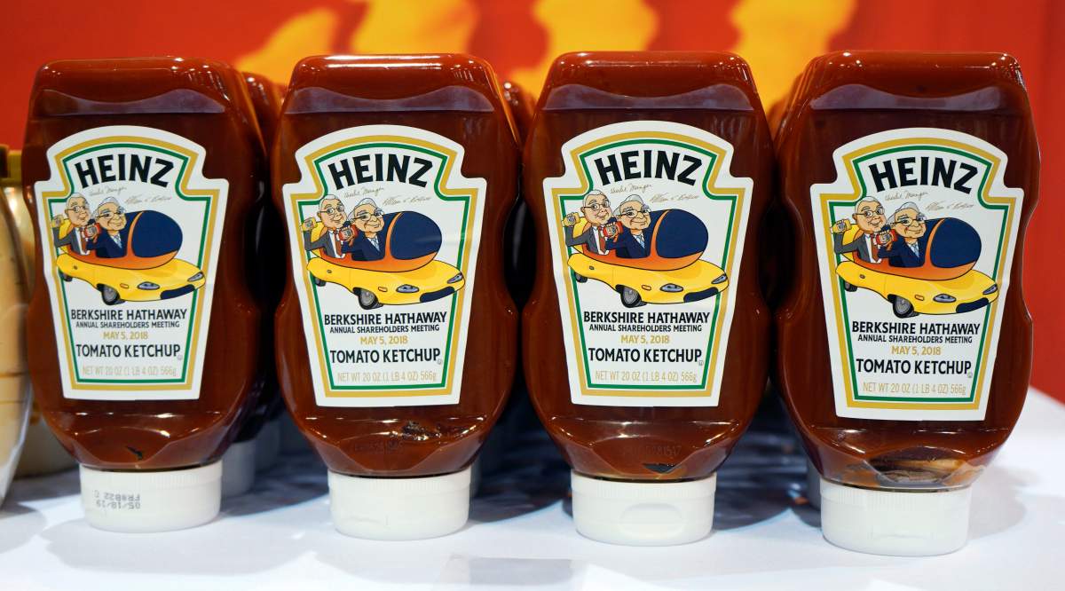 Bottles of Heinz tomato ketchup bear a special Berkshire Hathaway label as they are offered for sale to shareholders on the exhibit floor at the CenturyLink Center in Omaha, Neb., Friday, May 4, 2018, where Berkshire brands display their products and services. On Saturday, shareholders are expected to fill the CenturyLink arena as they attend the annual Berkshire Hathaway shareholders meeting where Buffett and his Vice Chairman Charlie Munger preside over a Q&A session.