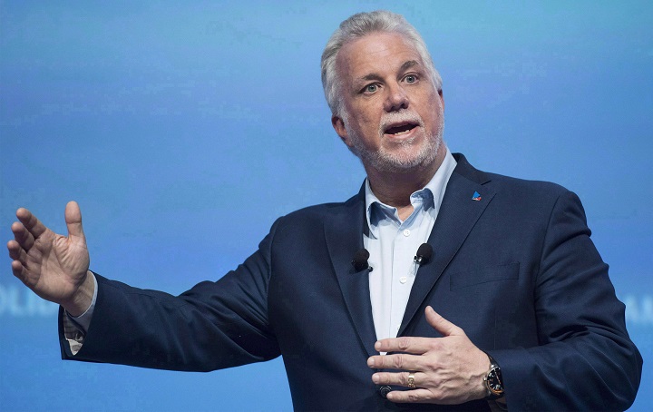 Quebec Premier Philippe Couillard speaks during a Quebec Liberal party general council meeting in Montreal, Saturday, June 2, 2018. The premier announced an early start to the election campaign. Saturday, Aug. 11, 2018.