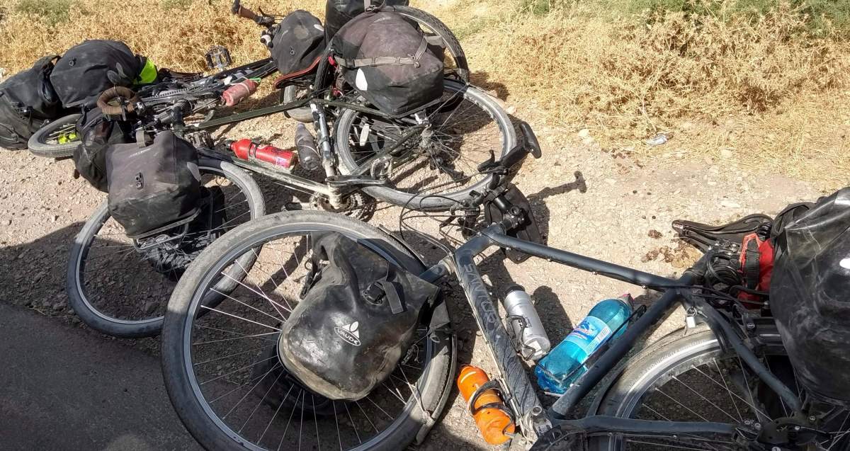 In this photo taken on Sunday, July 29, bicycles are left where four tourists were killed when a car rammed into a group of foreigners south of the capital of Dushanbe, Tajikistan. The Islamic State group on Tuesday claimed responsibility for a car-and-knife attack on Western tourists cycling in the country that killed two Americans and two Europeans.