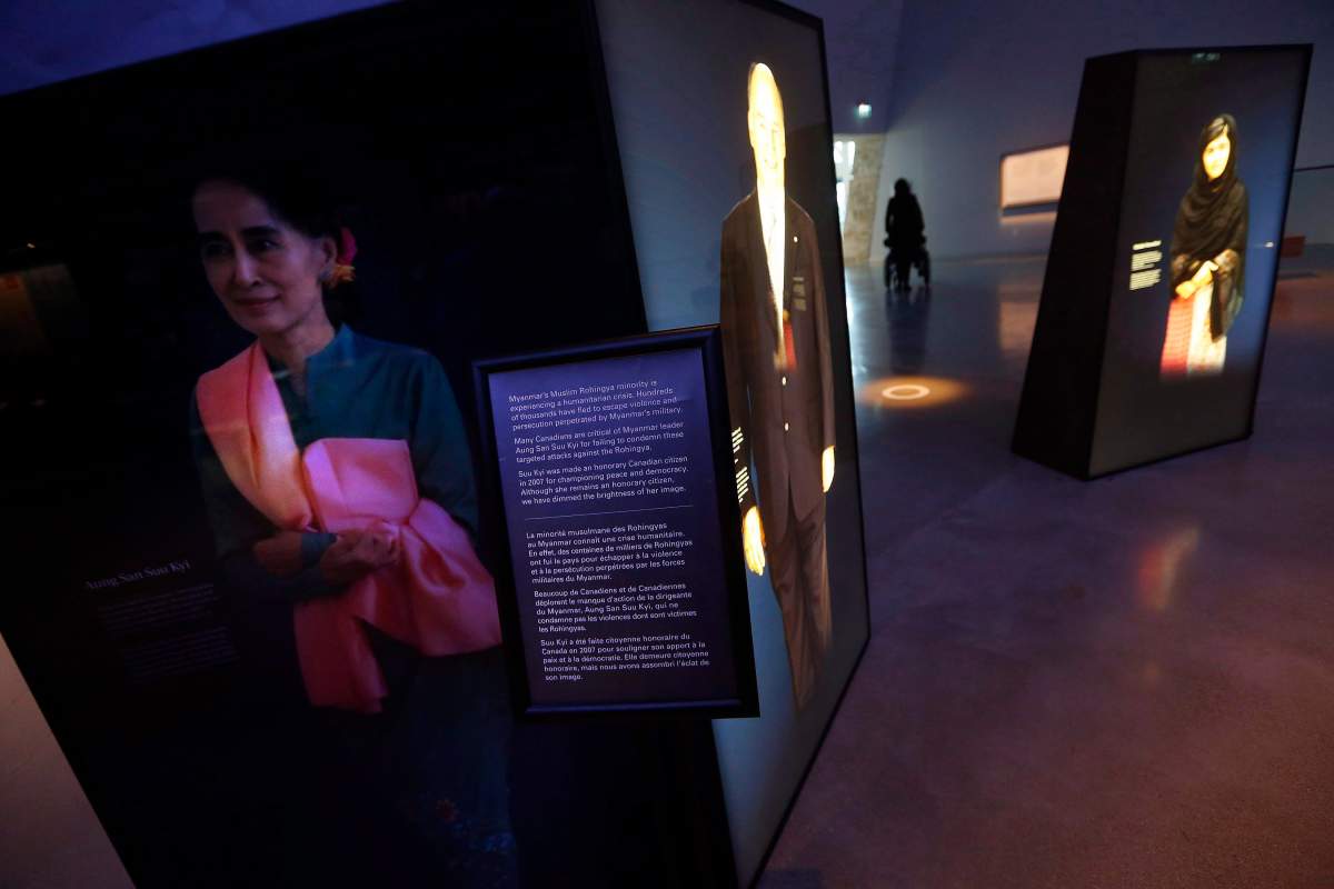 The Canadian Museum of Human Rights has dimmed the portrait of Aung San Suu Kyi in Winnipeg, Man., on Wednesday, August 1, 2018. Myanmar’s leader Aung San Suu Kyi will be removed from a display at the Canadian Museum for Human Rights over the humanitarian crisis facing her country’s Rohingya Muslims.