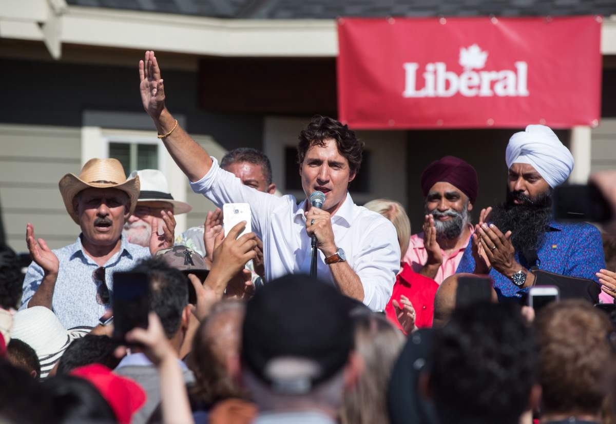 Prime Minister Justin Trudeau speaks at a Liberal Party barbecue in Delta, B.C., on Sunday August 5, 2018. (Darryl Dyck/The Canadian Press)