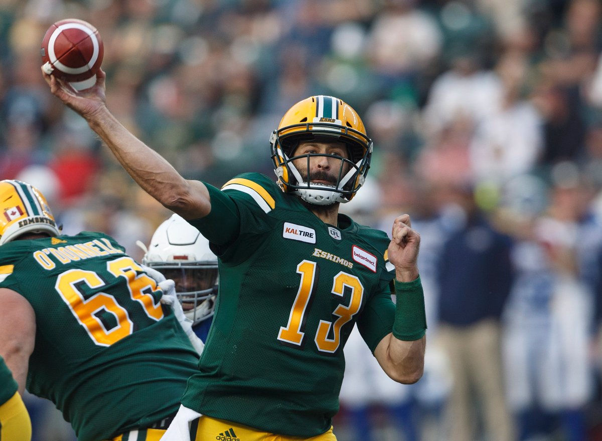 Edmonton Eskimos quarterback Mike Reilly (13) makes the throw against the Montreal Alouettes during first half CFL action in Edmonton, Alta., on Saturday August 18, 2018. 