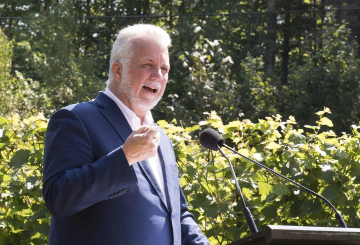 In this file photo, Quebec Liberal Leader Philippe Couillard speaks to candidates in preparation for the general election. Couillard warns against giving in to American demands surrounding Canada's supply management system during NAFTA talks. Wednesday, Aug. 29, 2018.