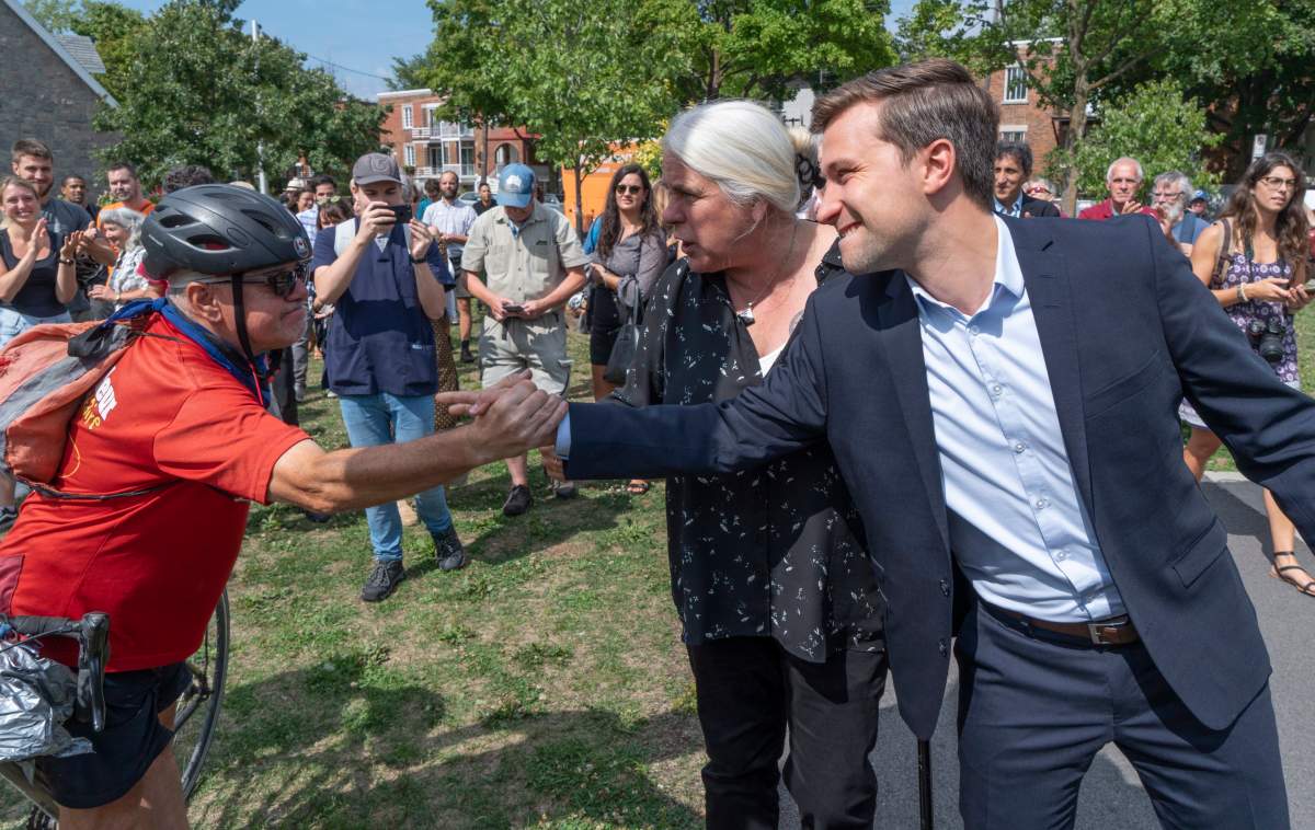 Quebec Solidaire co-spokesperson Gabriel Nadeau-Dubois and Manon Masse greet supporters as they arrive to launch their campaign in Montreal on Thursday, August 23, 2018. Quebecers will go to the poll Oct. 1.