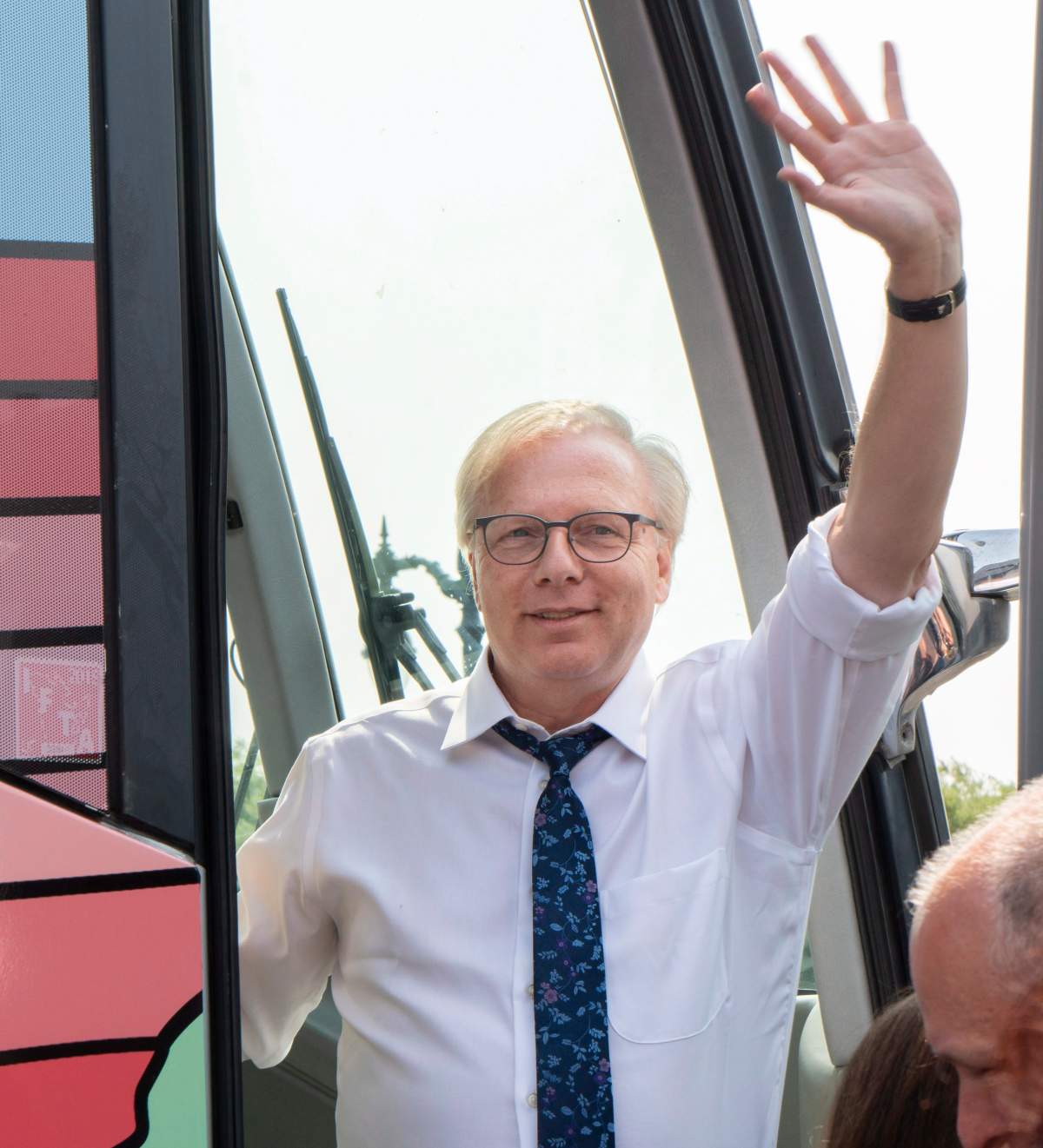 PQ leader Jean-Francois Lisee greets supporters as he steps off his bus during a campaign stop in Chambly, Que. on Friday, August 24, 2018. 