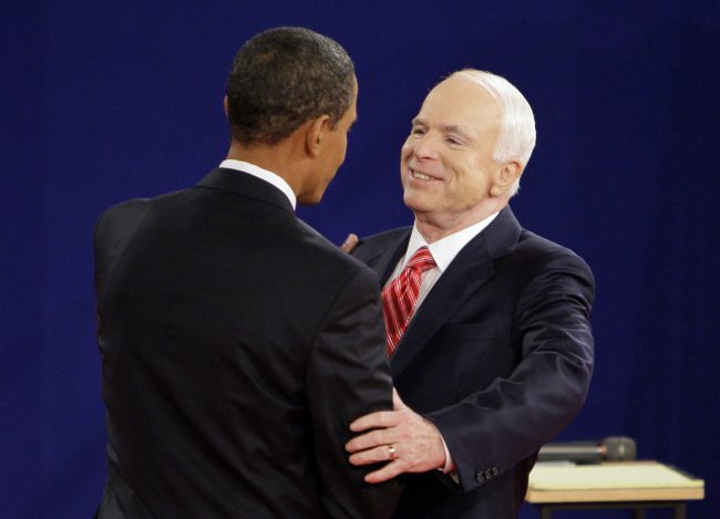 In this Oct. 7, 2008, file photo, Democratic presidential candidate Sen. Barack Obama and Republican presidential candidate Sen. John McCain, R-Ariz., greet each other at the start of a townhall-style presidential debate at Belmont University in Nashville, Tenn.