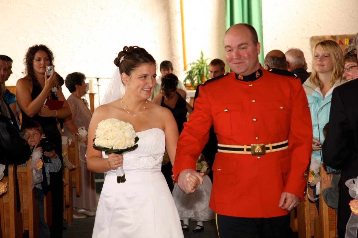 Officer Graeme Kingdon with his wife, Nakella, on their wedding day. 