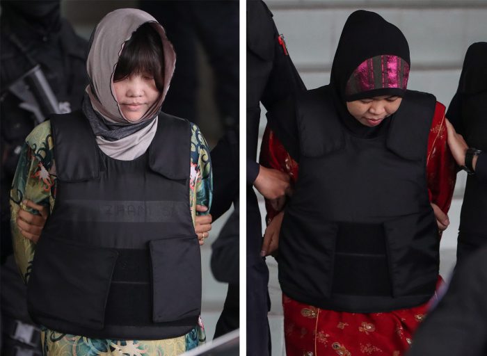 A combination photo of Vietnamese Doan Thi Huong (left) and Indonesian Siti Asiyah (right) who were detained in connection with the death of Kim Jong-Nam, are escorted out of the Shah Alam High Court in Shah Alam, Malaysia, 16 August 2018.