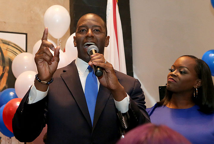 Andrew Gillum with his wife, R. Jai Gillum at his side, addresses his supporters after winning the Democrat primary for governor on Tuesday, Aug. 28, 2018, in Tallahassee, Fla. 