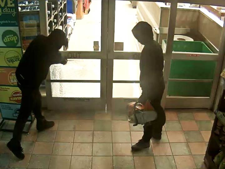 Saskatoon police believe two men were targeting ATMs in two break-ins minutes apart.