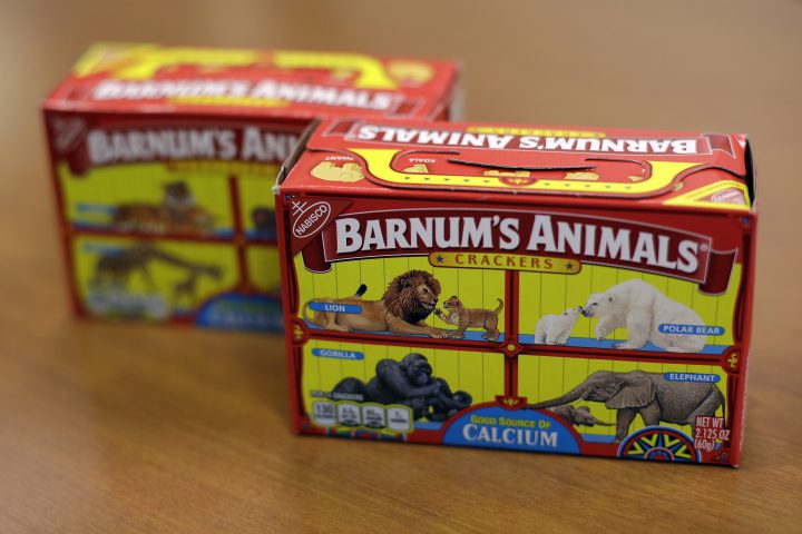 This Monday, Aug. 20, 2018, photo shows boxes of Nabisco’s Barnum’s Animals crackers in Chicago, with the old design implying the animals were in cages.