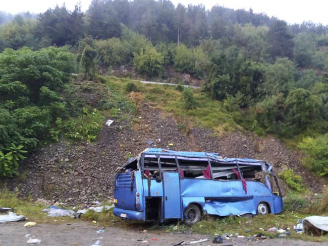 A view of a bus that crashed and overturned near the town of Svoge, Bulgaria, Aug. 25, 2018.