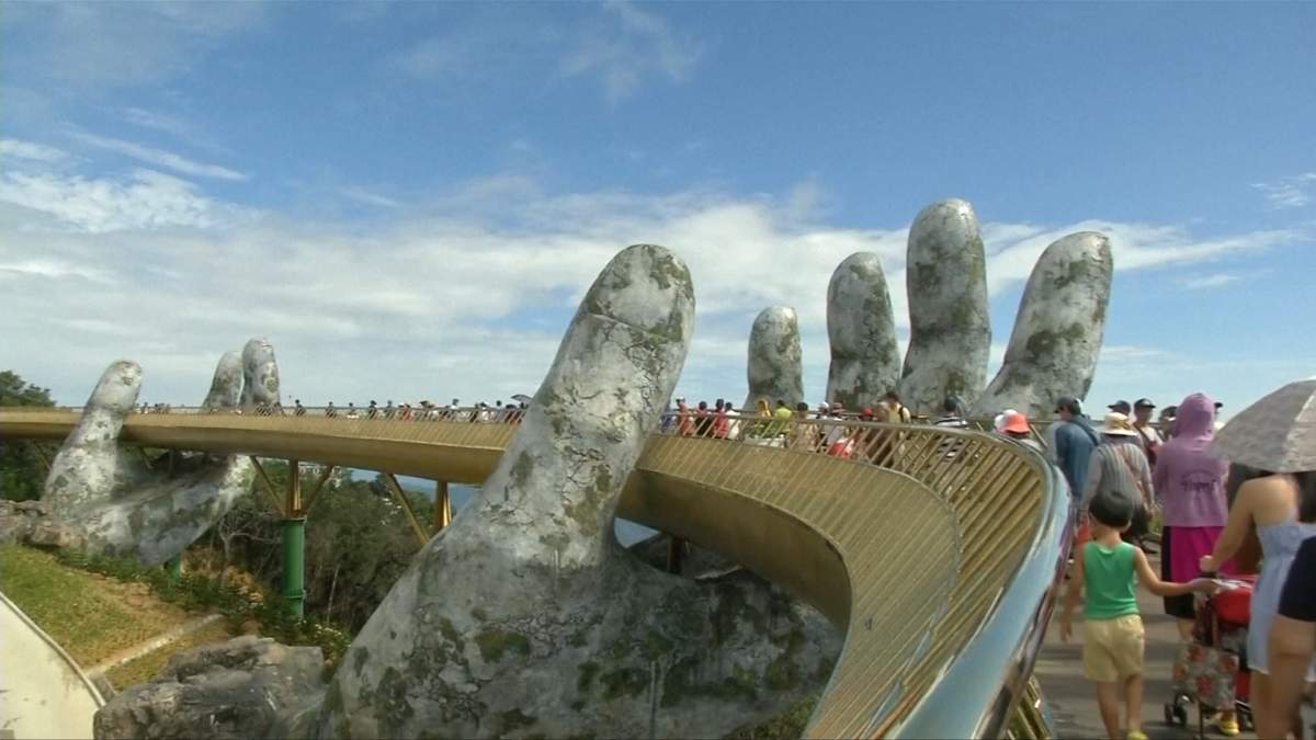 A look at Vietnam’s ‘Golden Bridge,’ a colossal pair of hands lifting a golden walkway - image