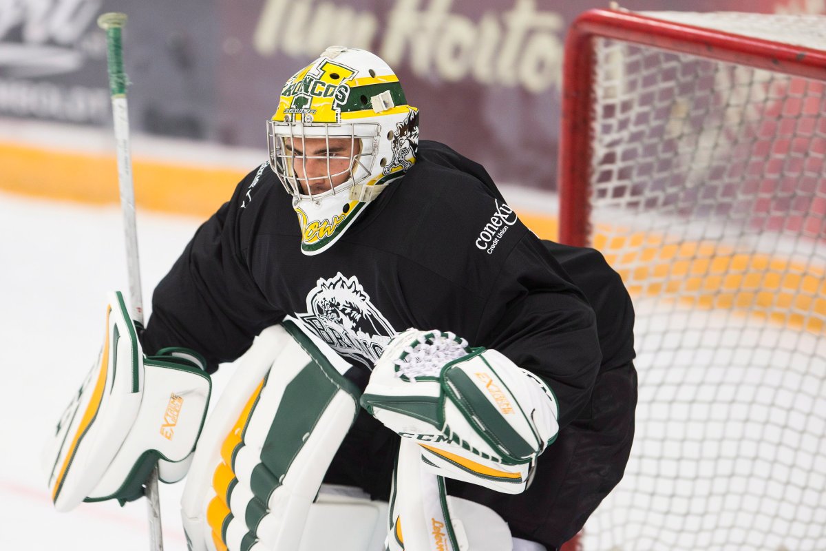 Goalie Dane Dow wears a commemorative helmet during the first day of the Humboldt Broncos training camp at Elgar Petersen Arena in Humboldt , Sask. on Friday, August, 24, 2018. 