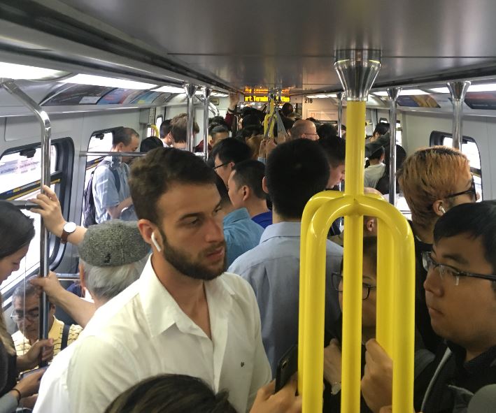 Canada Line trains are packed Friday morning. Credit: Jesse Ferreras / Global News