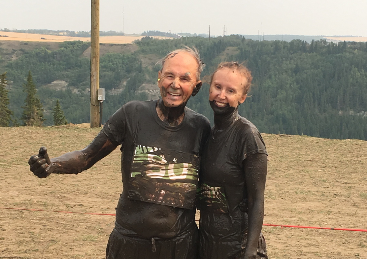 Art Noble, 80, completes the Mud Hero race in Red Deer, Alta., on Aug. 10 alongside his daughter, Denise King.