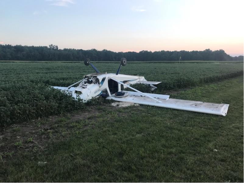 Police say the plane crashed and flipped over upon landing.