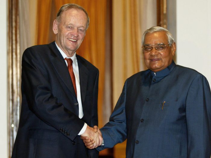 In this file photo, Prime Minister Jean Chretien is greeted by Indian Prime Minister Atal Bihari Vajpayee prior to a meeting in New Delhi, on Oct. 24, 2003.