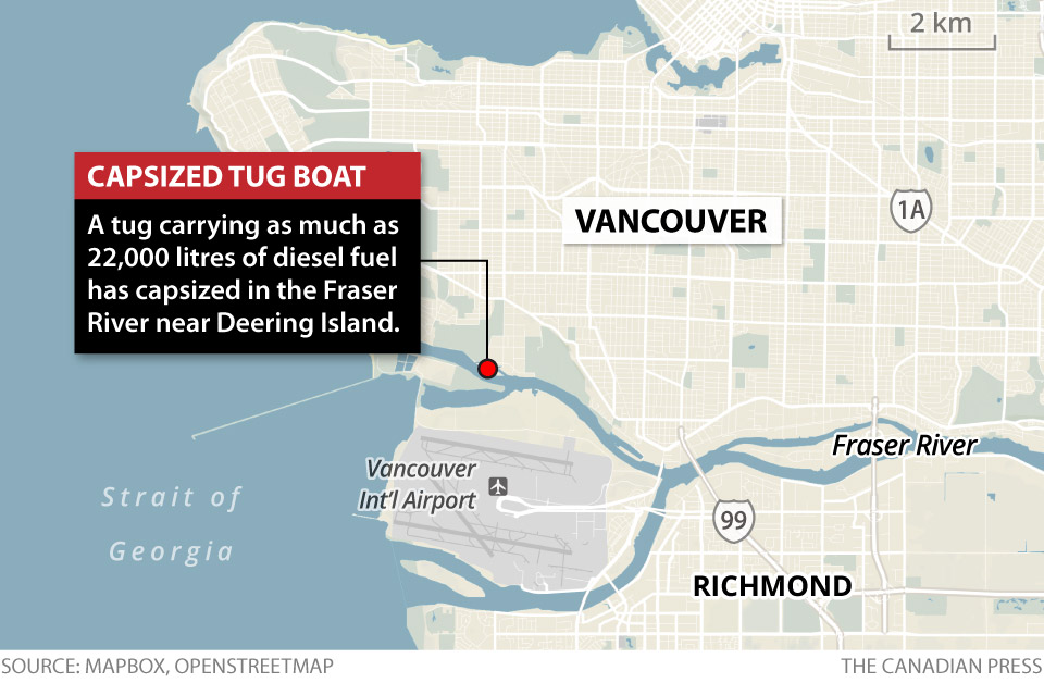 A tug carrying as much as 22,000 litres of diesel fuel has capsized in the Fraser River between Vancouver and Richmond.