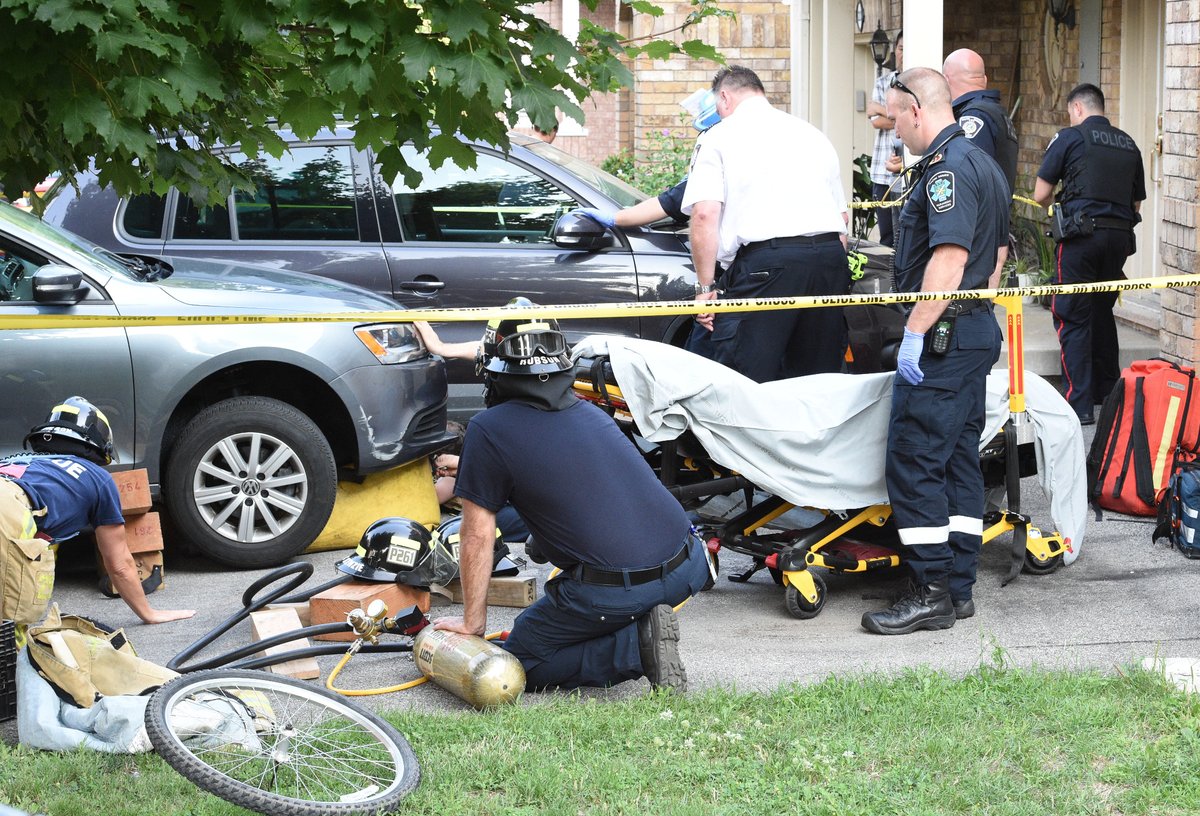 Boy rescued after being trapped under vehicle in Oakville - image