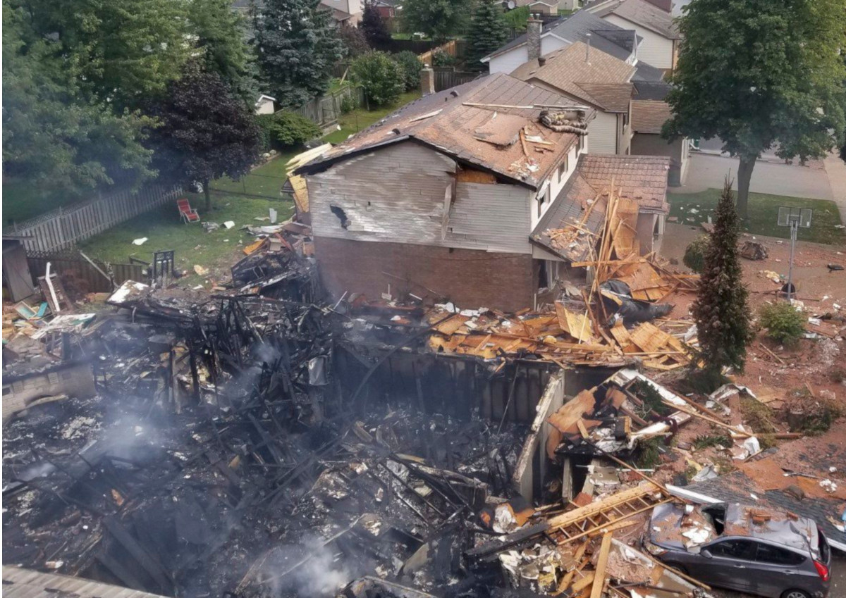 Debris is shown following a house explosion in Kitchener, Ont., on Wednesday, Aug. 22, 2018.