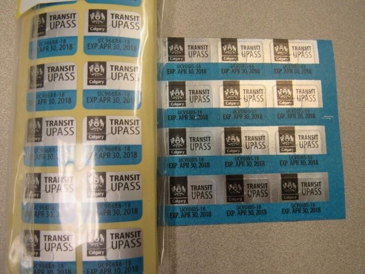 Calgary police have charged a man with trafficking fake Calgary transit passes.
