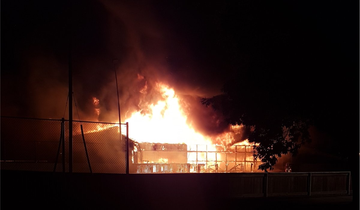 A fire tore through a storage building at Assiniboia West Community Centre Thursday.