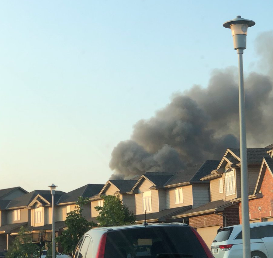 Smoke could be seen in the neighbourhood as two barns burned in northeast London.