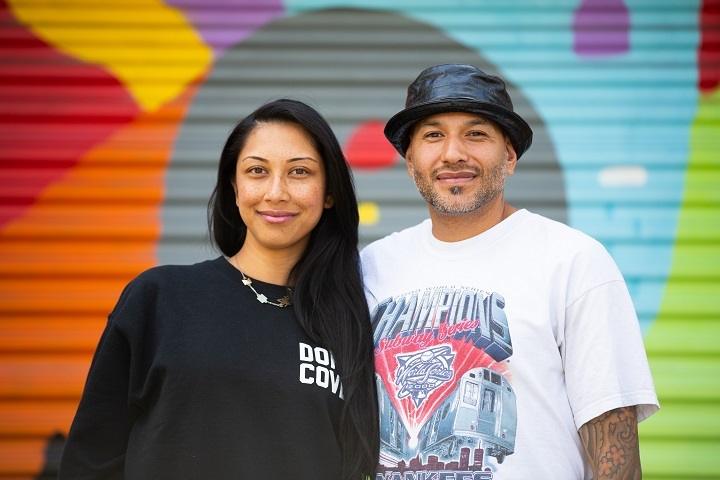 Annaliza Toledo and Trevor Peters are mural artists in Edmonton