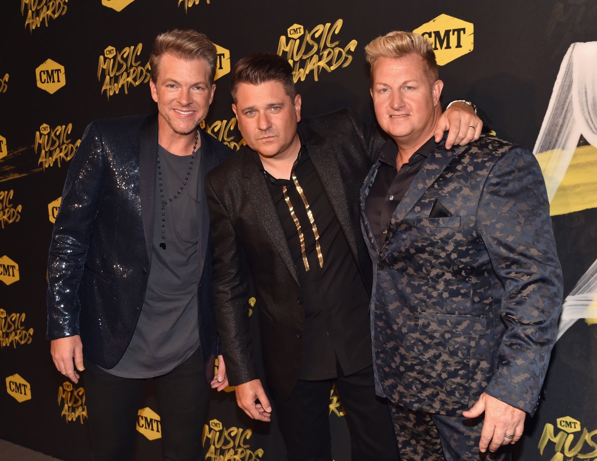 (L-R) Joe Don Rooney, Jay DeMarcus and Gary LeVox of musical group Rascal Flatts attend the 2018 CMT Music Awards at Nashville Municipal Auditorium on June 6, 2018 in Nashville, Tennessee.  