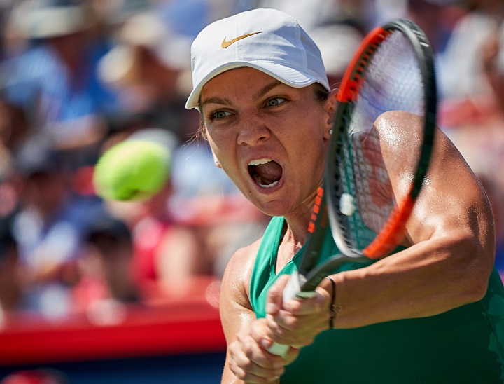 Simona Halep of Romania in action against Sloane Stephens of the US during the final of the Rogers Cup Women's tennis tournament in Montreal, Canada, 12 August 2018.  