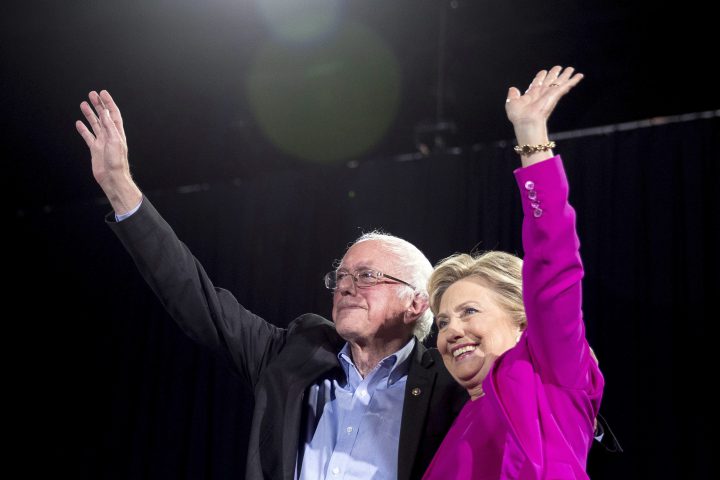  In this Nov. 3, 2016, file photo, Democratic presidential candidate Hillary Clinton and Sen. Bernie Sanders, I-Vt., appear on stage at a rally in Raleigh, N.C. 