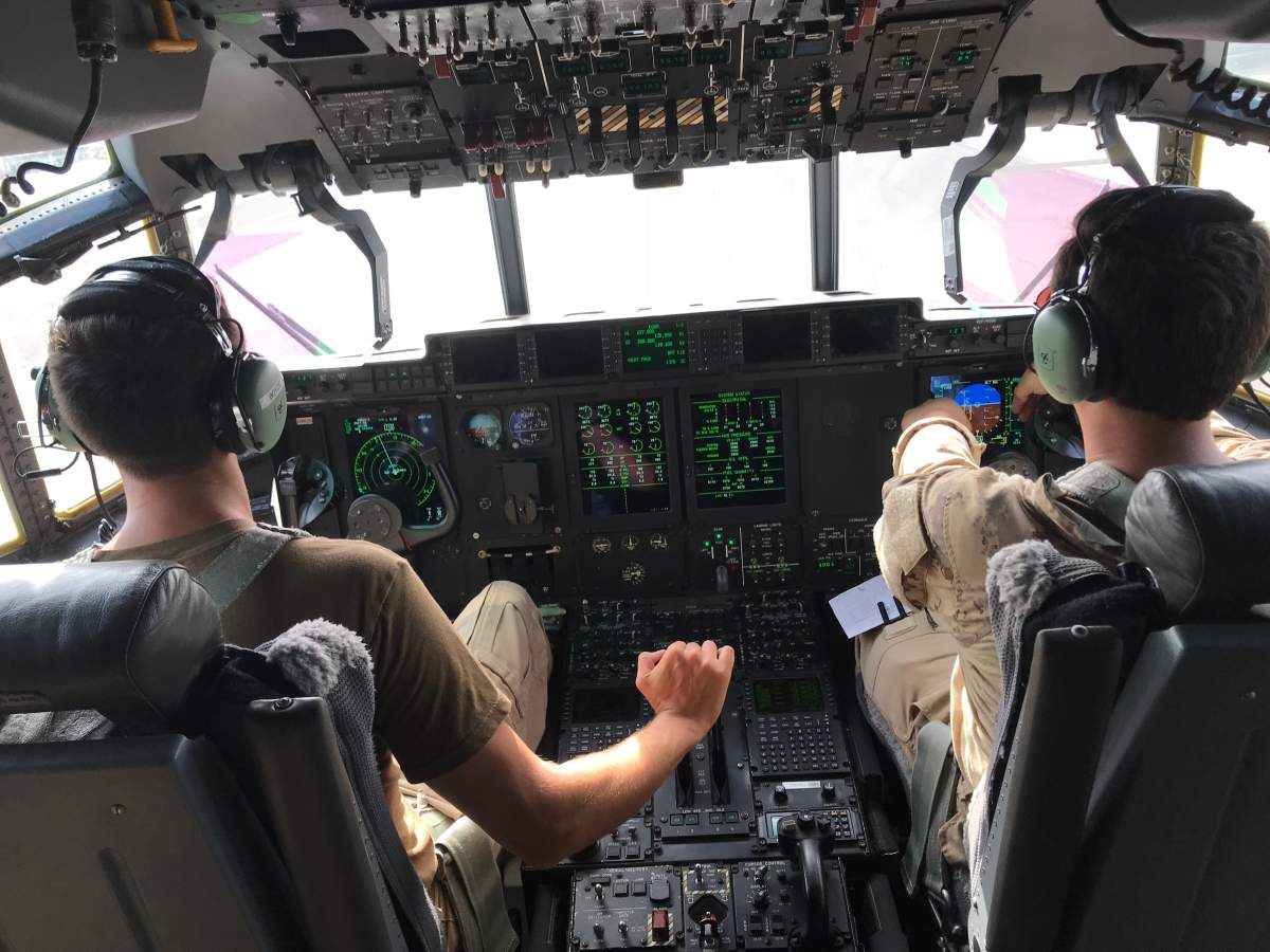 Pilots in the cockpit of the Hercules.