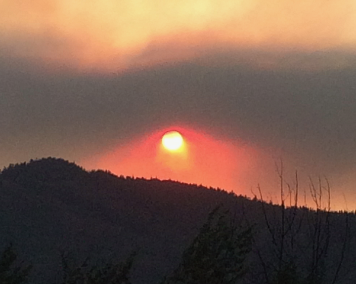 A smoky sunrise near the Horns Mountain wildfire in Washington state.
