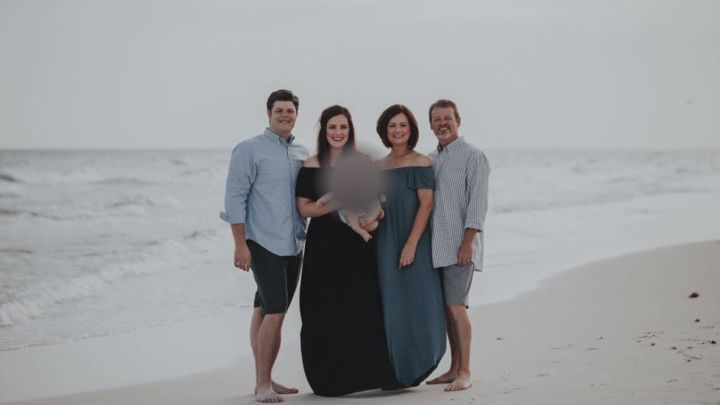 A photo of a family involved in a horrific crash near Jasper, Alta. on Tuesday. From left to right: Nick Copeland, Sarah Copeland, the Copelands’ child (face blurred), Angela Dye Elkins, Curtis Elkins.