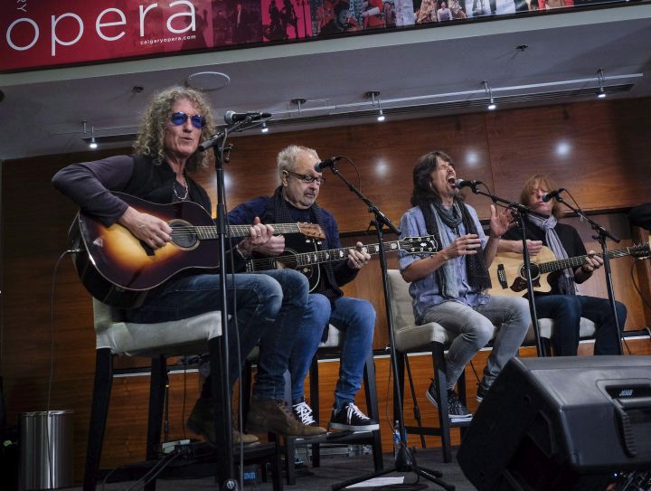 Members of the rock band Foreigner, left to right, Michael Bluestein, Mick Jones, Kelly Hansen, and Jeff Pilson perform at a news conference about an upcoming musical called "Jukebox Hero," in Calgary, Alta., Wednesday, Oct. 11, 2017.