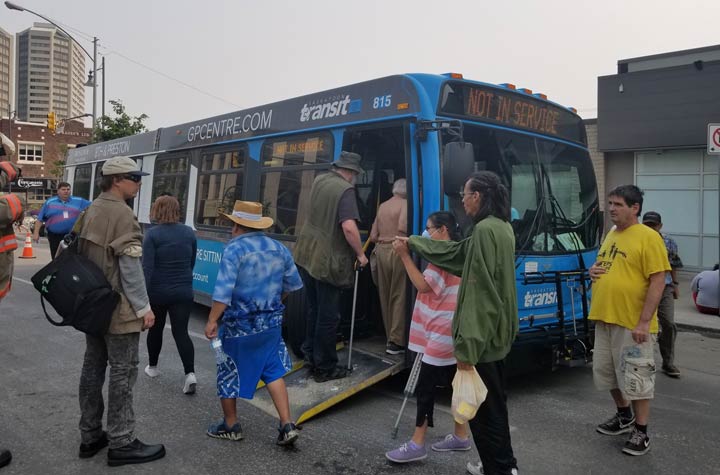 Due to high temperatures, the fire department asked Saskatoon Transit to deliver a bus to the scene. The Lighthouse occupants were allowed on the bus for relief from the hot weather, and given water.