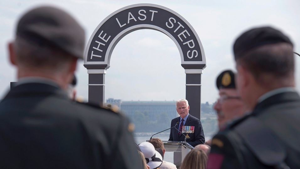 Ken Hynes, curator of the Army Museum, delivers remarks at a commemorative event linking the Last Steps and Canada Gate memorials to mark the connection between Canada and Belgium on the centennial of the Last Hundred Days of the Great War in Halifax on Wednesday, Aug. 8, 2018. 
