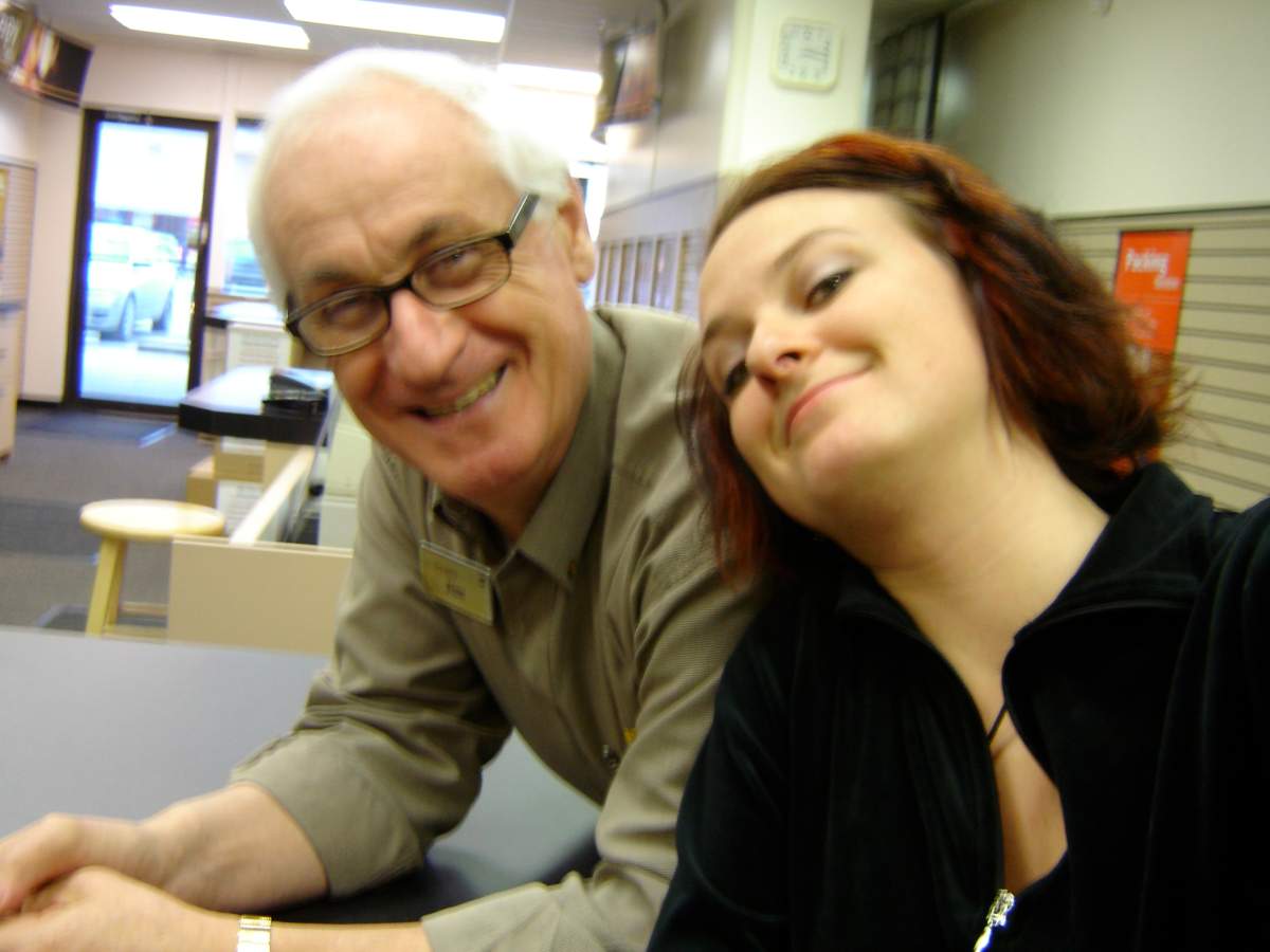 Lindsey White and her father Jim at his UPS franchise store.