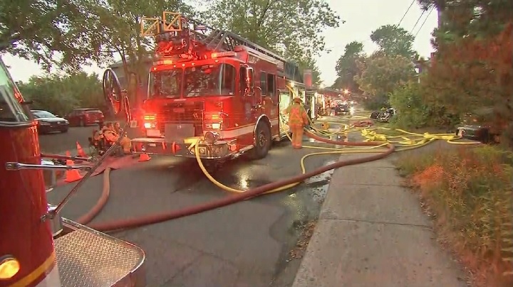 Firefighters tackle a three-alarm fire in Longueuil. Sunday, Aug. 12, 2018.