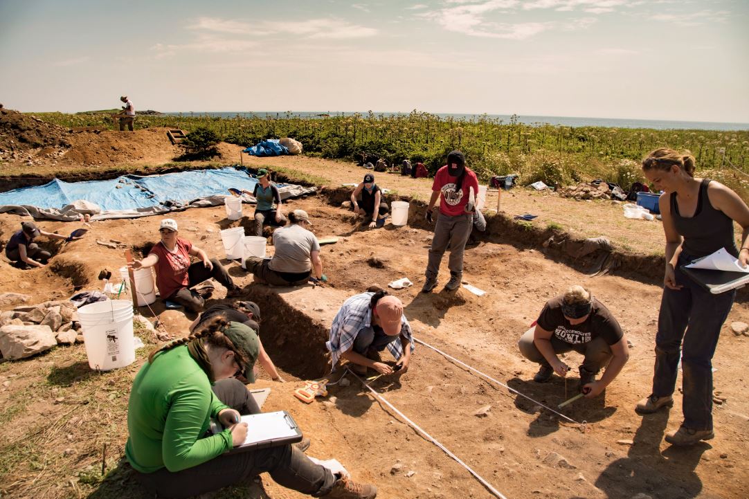Students from across North America work at a burial site at Rochefort Point at the Fortress of Louisbourg, N.S., in this undated handout photo. 