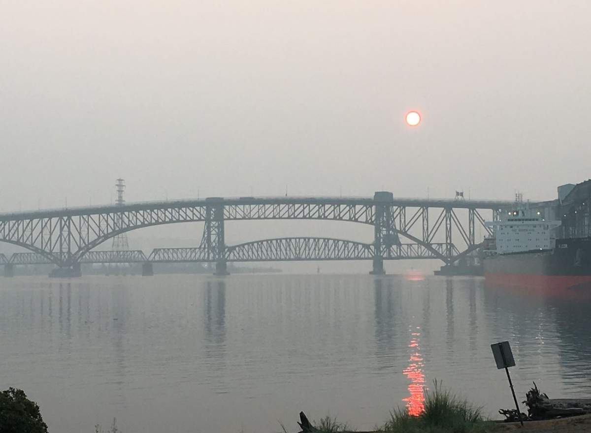 The smoky sunrise from New Brighton Park in Vancouver Tuesday morning.