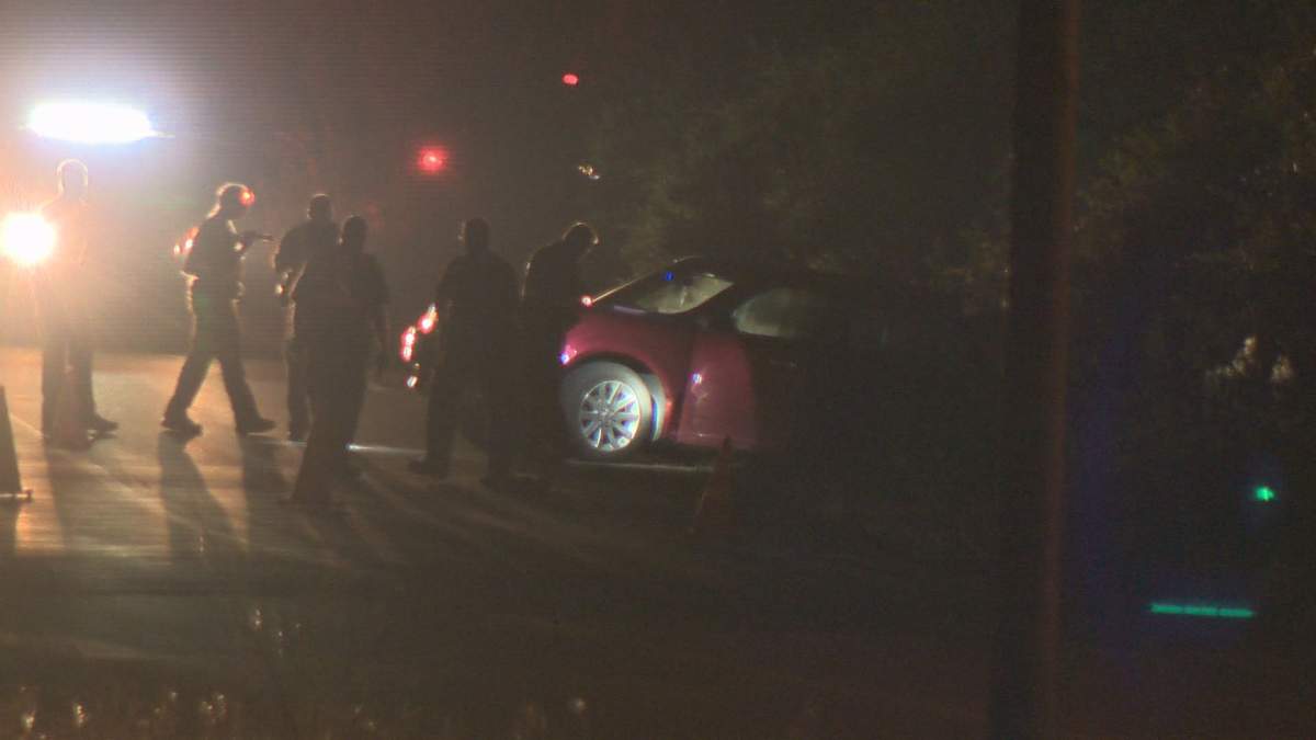 A red vehicle crashed on a rural stretch of 18 Street, between 153 Avenue and Anthony Henday Drive, on Wednesday, August 22, 2018.